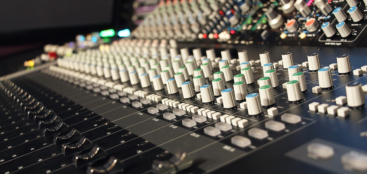 Close-up of our Solid State Logic XL-Desk analog mixing console.